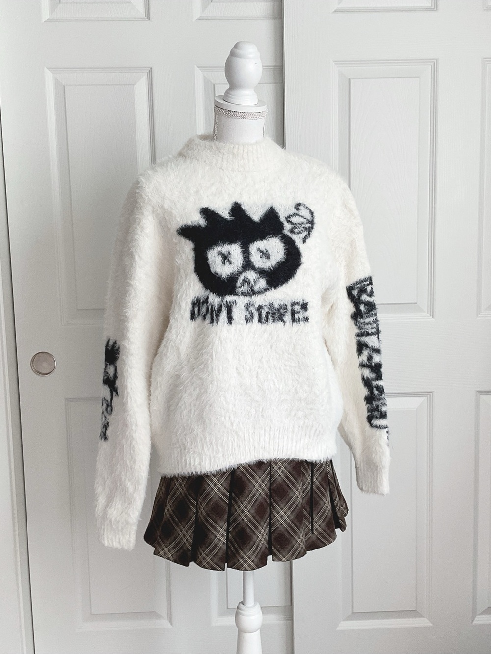 White Fuzzy Crewneck Sweater with Batz-Maru Graphic